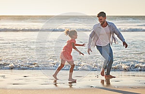 Child and father on beach running in ocean together together for body movement wellness, exercise and healthy
