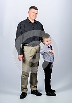 Child with father. business partner. little boy with dad businessman. childhood. parenting. fathers day. family day