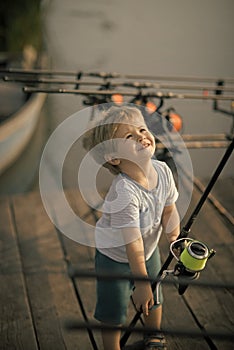 Child is fishing. Angling, fishing, activity, adventure, hobby, sport