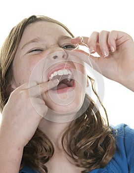 Child flossing photo