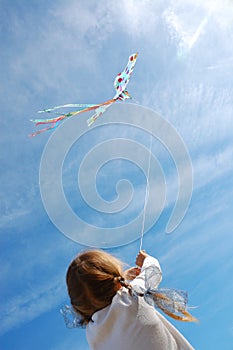 Child flying a kite photo