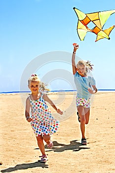 Kid flying kite outdoor.