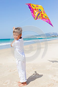 Child flying kite beach outdoor.