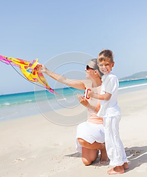 Child flying kite beach outdoor.