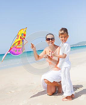 Child flying kite beach outdoor.