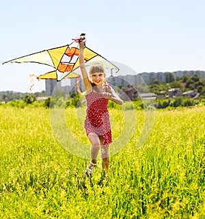 Child flying kite outdoor.