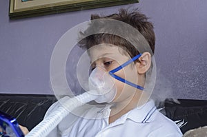 Child with fogging mask on his face playing game