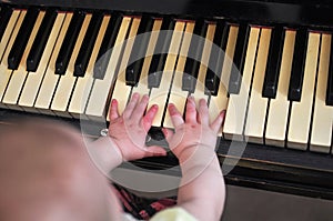 Child with fortepiano photo