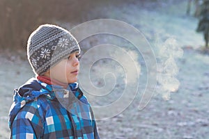 Child on frosty morning in park