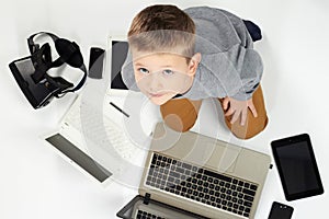 Child with gadgets. little boy and new technology