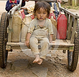 Child with gasoline can