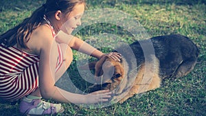 Child and German Shepherd