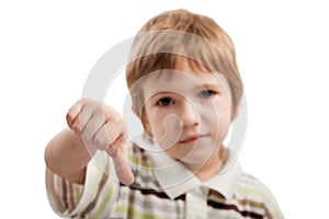 Child gesturing thumb down