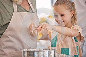 Child, girl and baking with eggs, grandparent or senior woman in kitchen, bonding house or family home for pastry