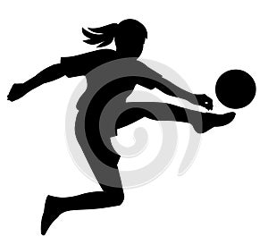 Child girl black silhouette of a junior women's football player jumping over the field hitting the ball