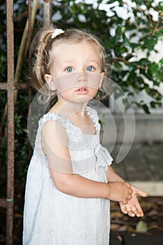 child girl blonde with perfect blue eyes