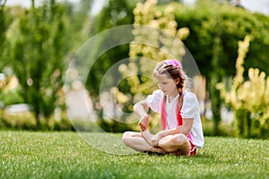 child girl with braided hair style with pink kanekalon