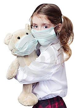 Child girl caucasian in medicine mask isolated on white.
