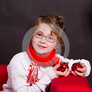 Child girl with christmas decoration