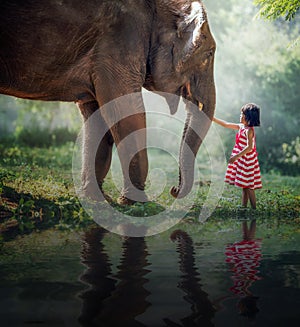 Child girl and elephant