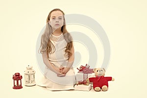 Child or girl with gift box, toy bear and lantern