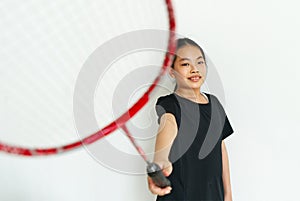 child girl holding badminton racket