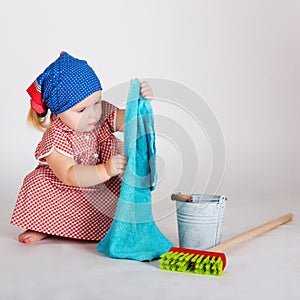 Child girl housewife cleaner