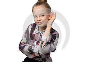 Child-girl with long hair gathered in a bun