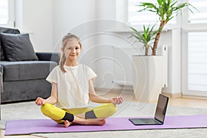 Child Girl Meditating During Online Class