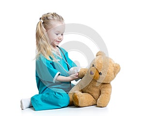 Child girl playing doctor photo