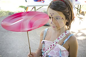 Child girl playing with spinning plate