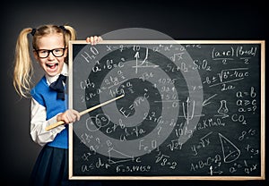 Child Girl Pointing School Blackboard with Mathematics Formulas, Amazed Kid as Teacher