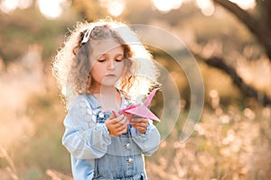 Child girl posing outdoors