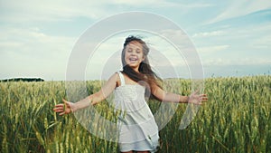 child girl running field park. girl kid run in the park wheat field at sunset silhouette. people in the park concept