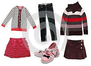 Child girl's modern autumn clothes isolated.