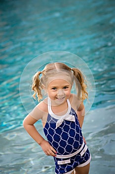 Child girl swim water