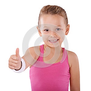 Child, girl and thumbs up in portrait, agreement or vote, like emoji and hand gesture on white background. Happy with