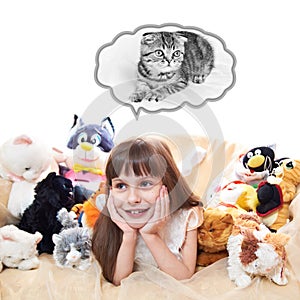 A Child Girl With Toy Cats Dreaming of a Real Cat