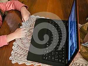 Child girl using laptop device for smart remote schooling in video call,covid-19 pandemic,distance learning 4k