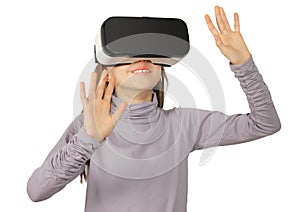 Child girl using virtual reality goggle, isolated on white photo