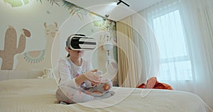 Child girl wearing virtual reality headset interacting with digital world, curious kid exploring universe with vr