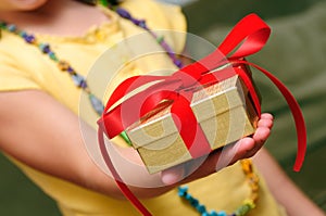 Child Giving Gift