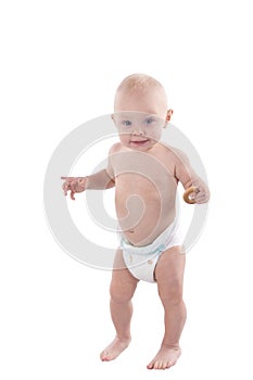 Child goes and plays in diapers