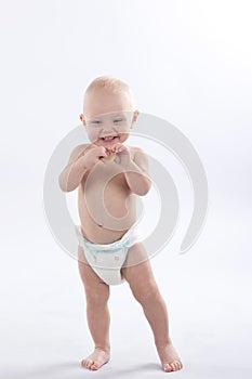 Child goes and plays in diapers