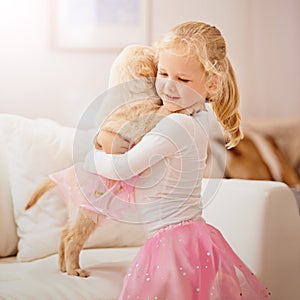 Child, golden retriever or dog in a house to hug for love, care and development. Face of a cute girl kid and animal