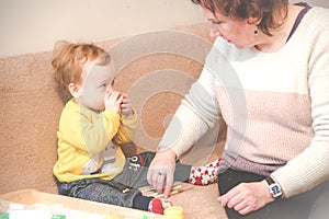 Child with grandmother playing