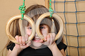 Child with gymnastic rings