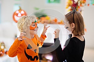 Child in Halloween costume. Kids trick or treat