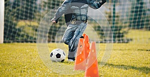 Child in Halloween Costume in Soccer Training. Kids Playing Football Ball on Grass Field