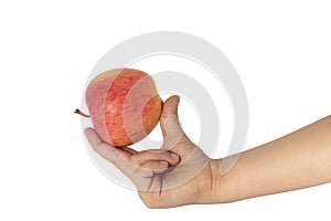 Child hand holding apple